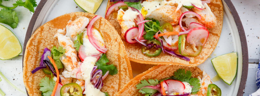 Grilled Fish Tacos with Lime Crema and Spicy Quick-Pickled Vegetables