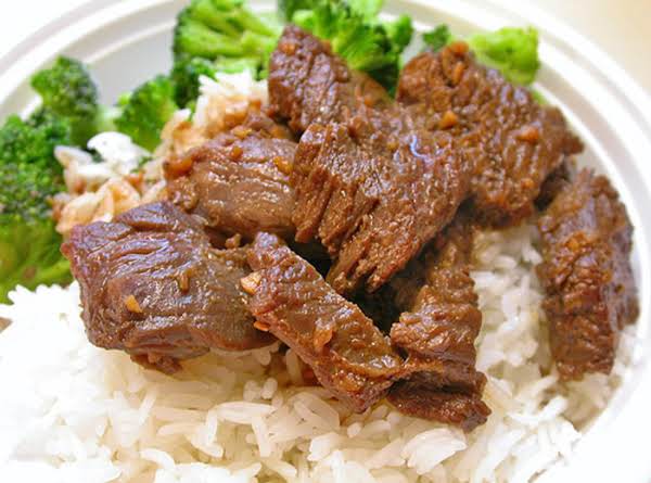 SAUCY BEEF OVER RICE